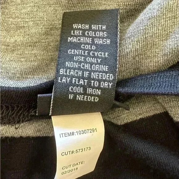 Torrid Grey and Black Stripe Sleeveless Shark Bite Top - Picture 4 of 4